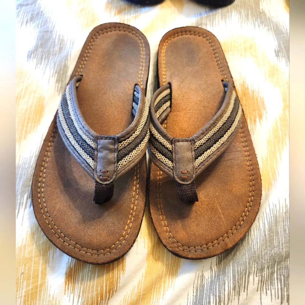 Brown and Tan Flip Flops